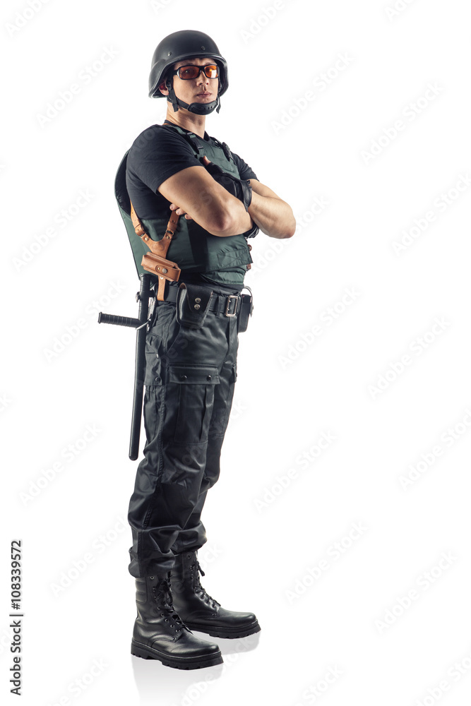 Police officer with crossed arms is looking on you. Isolated on Police officer with crossed arms is looking on you. Isolated on