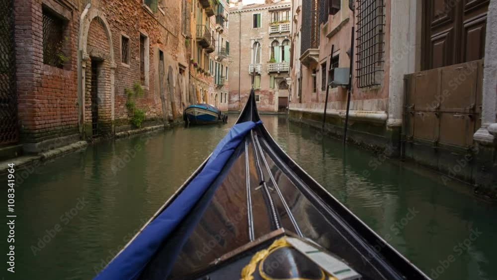 Gondola ride along the canals of Venice, Italy