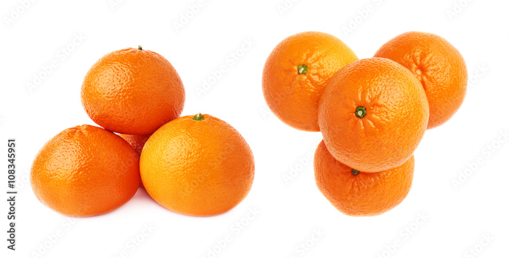 Piles of multiple ripe fresh juicy tangerines, isolated over the white background Piles of multiple ripe fresh juicy tangerines, isolated over the white background