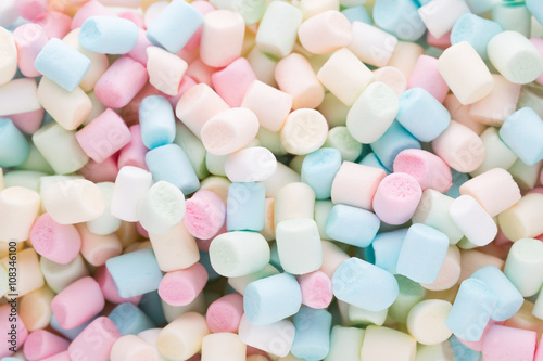 Background or texture of colorful mini marshmallows.
