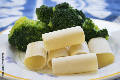 raw paccheri of gragnano and fresh broccoli photo