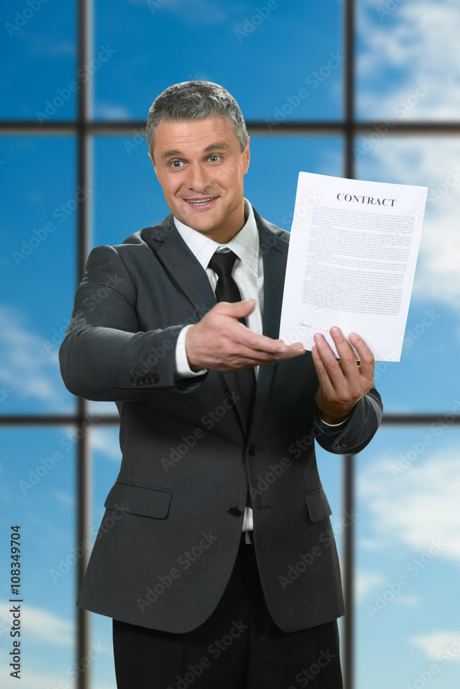 Mature businessman showing contract. Recruiter on blue sky background. Convince and motivate. Read the smallprint. Mature businessman showing contract. Recruiter on blue sky background. Convince and motivate. Read the smallprint.