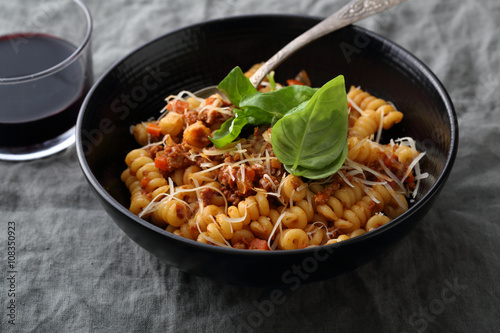 pasta with sauce bolognese and basil