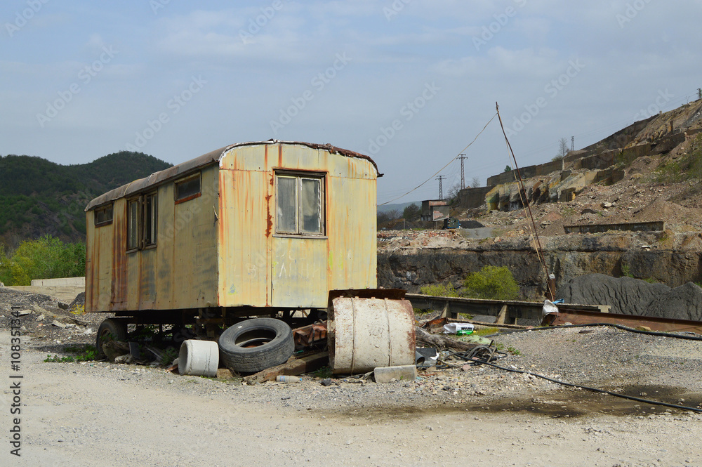 Old carriage among the ruins of abandoned metallurgy and flotation factory near Eliseyna railway station, Bulgaria