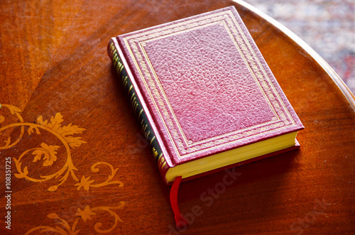 Beautiful Book on Vintage Table photo