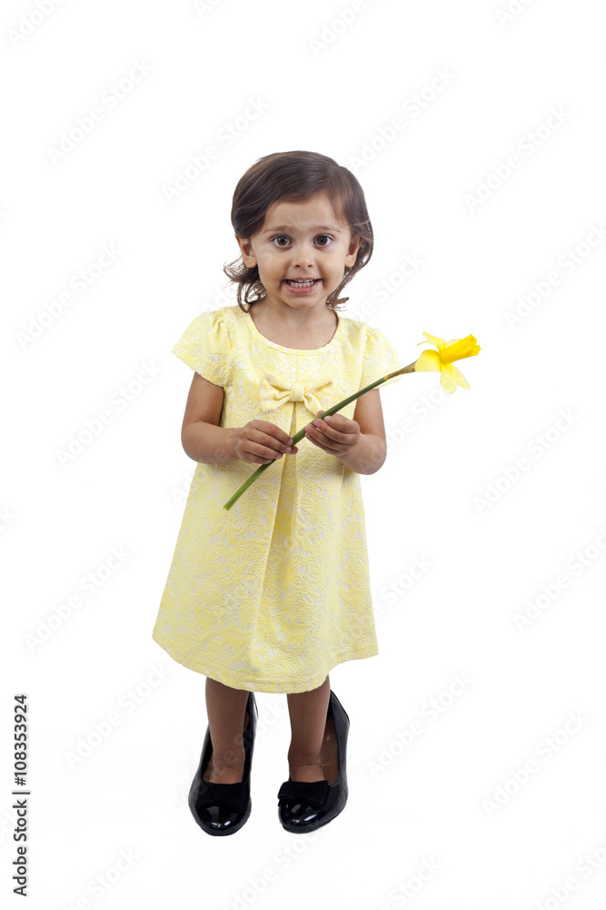 Girl with a daffodil isolated on white background Girl with a daffodil isolated on white background