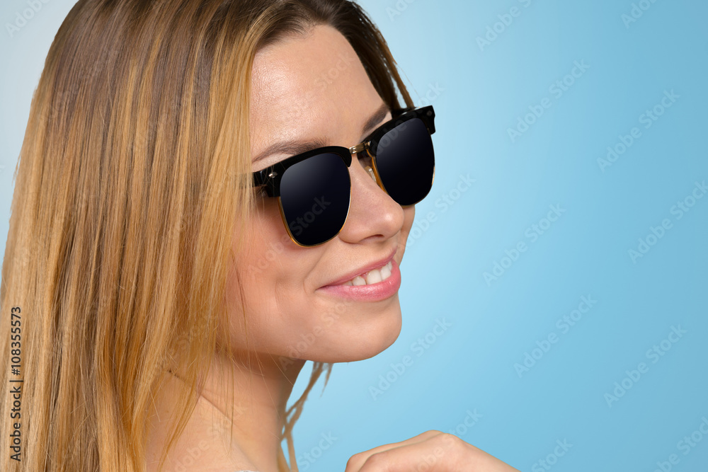 Head shot of woman wearing sunglasses Head shot of woman wearing sunglasses