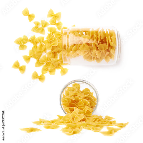 Set of glass jar filled with dry farfalle pasta over isolated white background
