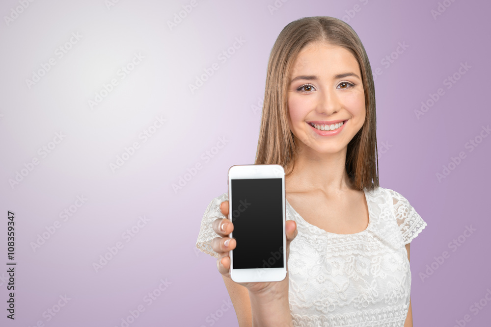 Happy pretty woman showing a blank smart phone screen Happy pretty woman showing a blank smart phone screen