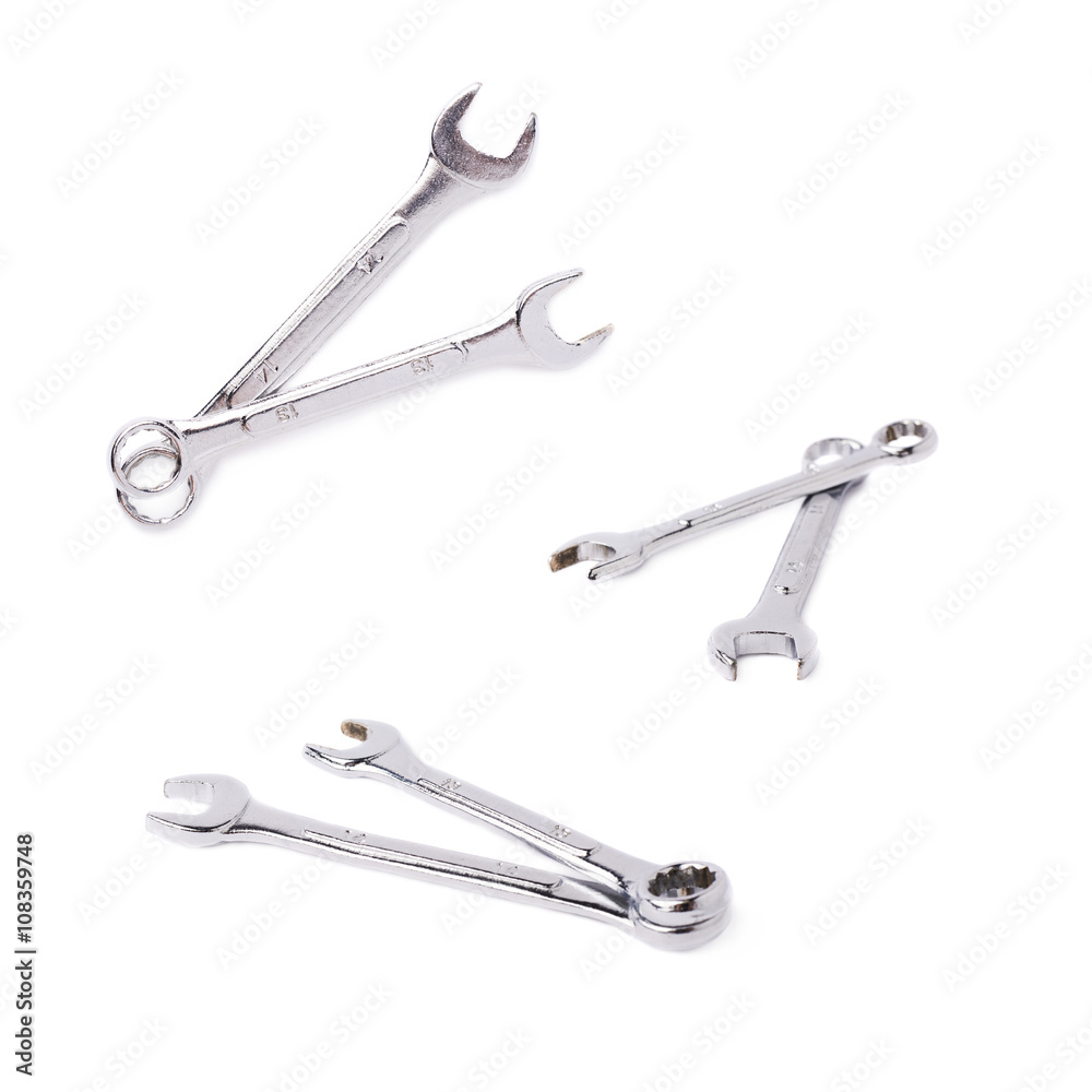 Set of wrenchs metal instruments isolated over white background Set of wrenchs metal instruments isolated over white background