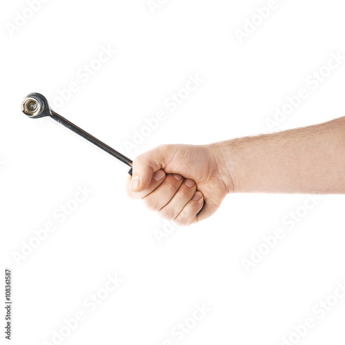 Hand holding a socket wrench tool, composition isolated over the white background © exopixel