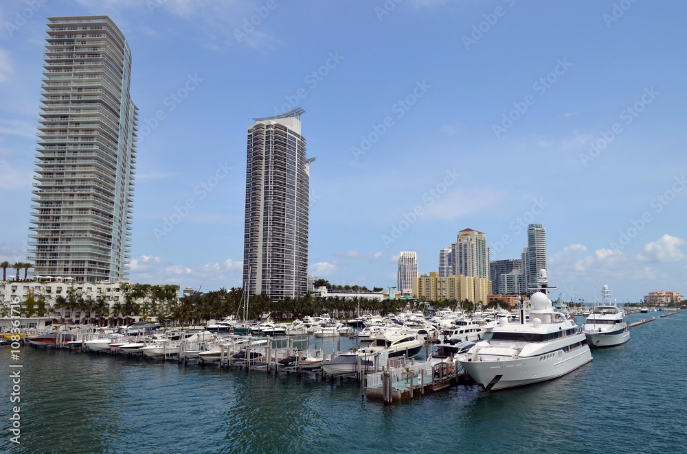 Luxury Condominium Towers overlooking a marina in miami beach,florida