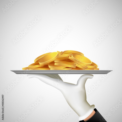 Human hand holding a tray with gold coins. Earnings and dividend