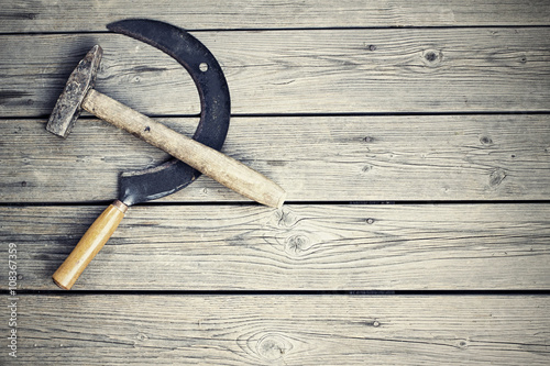 Hammer and sickle on wood