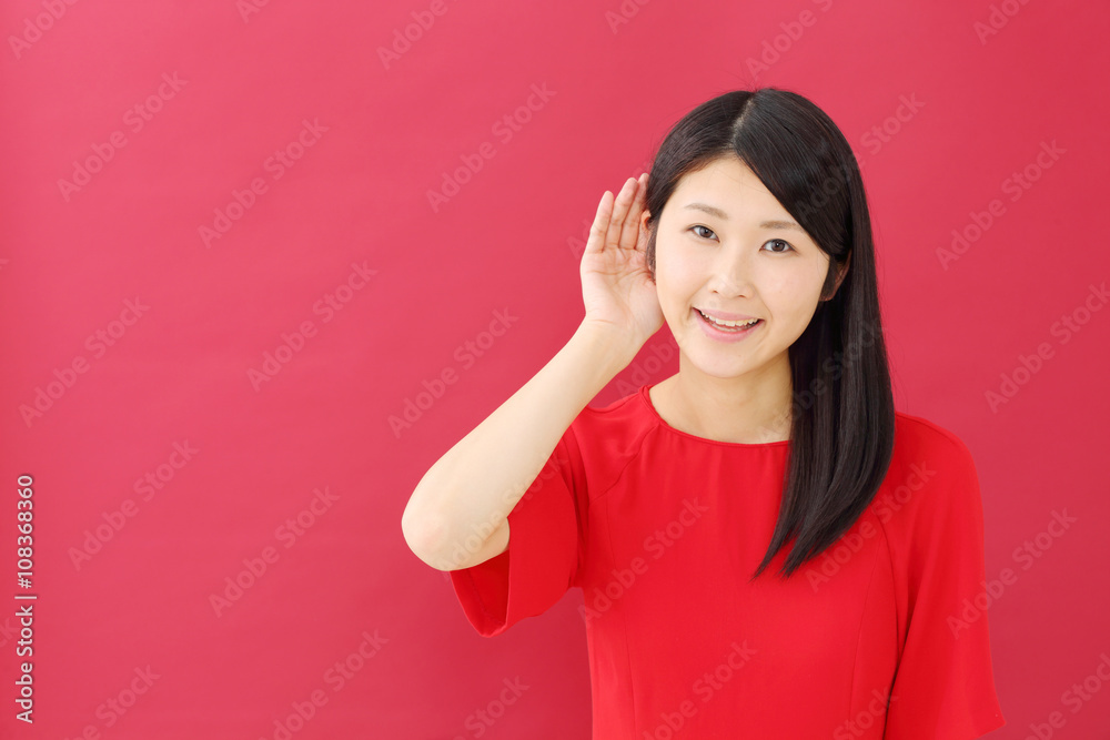 聞く・若い女性 聞く・若い女性