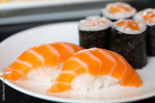 Sushi salmon on white plate