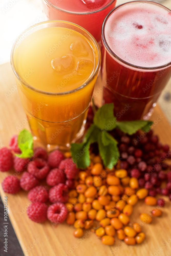 fruit drink with cranberries raspberries and sea buckthorn fruit drink with cranberries raspberries and sea buckthorn