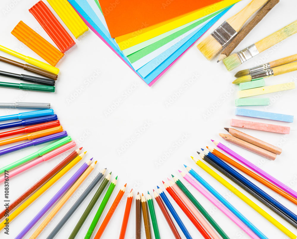 Heart shape frame from pencils, felt-tip pens and paper Heart shape frame from pencils, felt-tip pens and paper