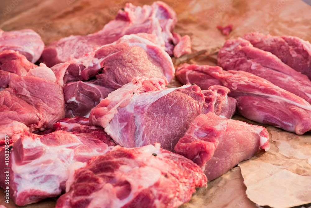 Heap of fresh raw meat food flesh in the market.