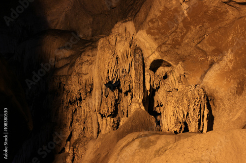 Stalactite and Stalagmite caves are located on the East coast of India, in the Ananthagiri hills of the Araku valley, Visakhapatnam in Andhra Pradesh, India. Formations of rocks inside Borra Caves. photo