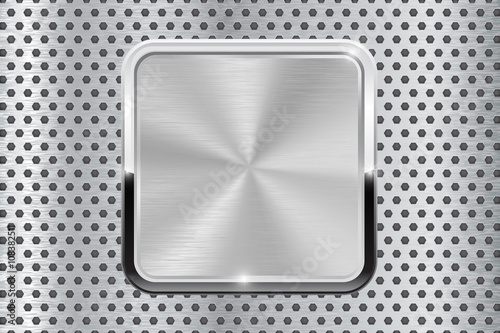 Metal button with chrome frame. On perforated background