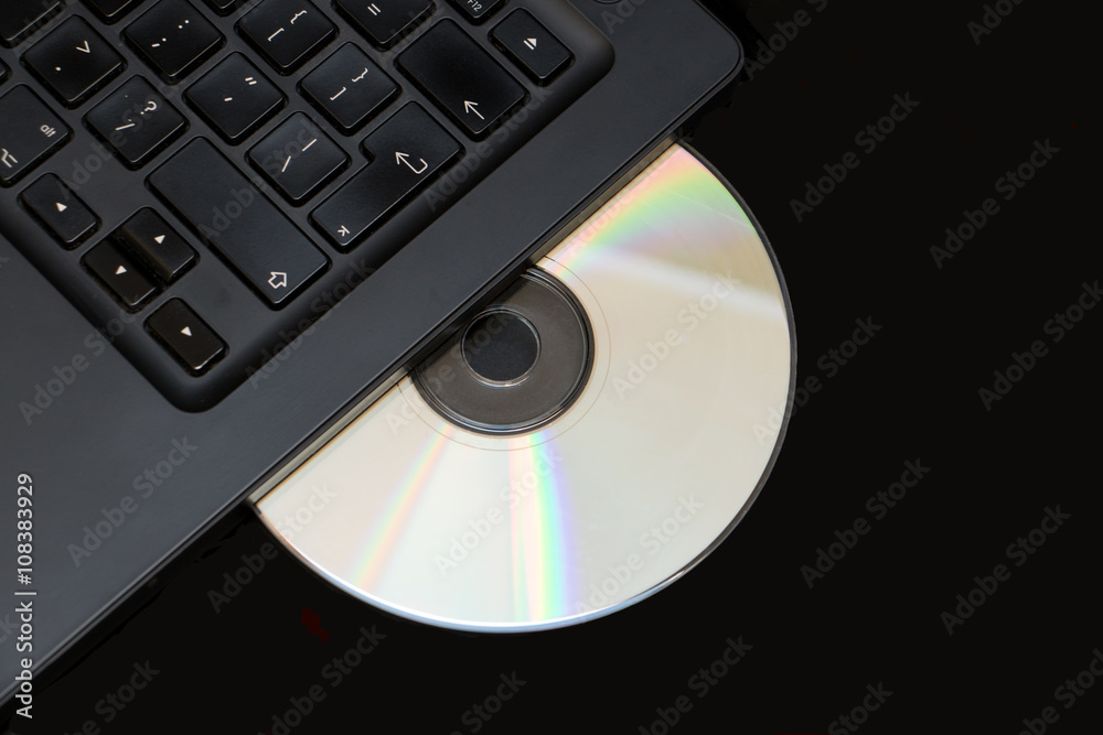 Selective focus cd or dvd in laptop drive Selective focus cd or dvd in laptop drive