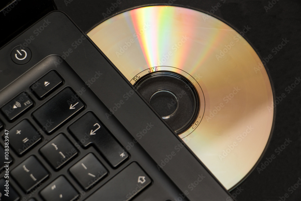 Selective focus cd or dvd in laptop drive Selective focus cd or dvd in laptop drive