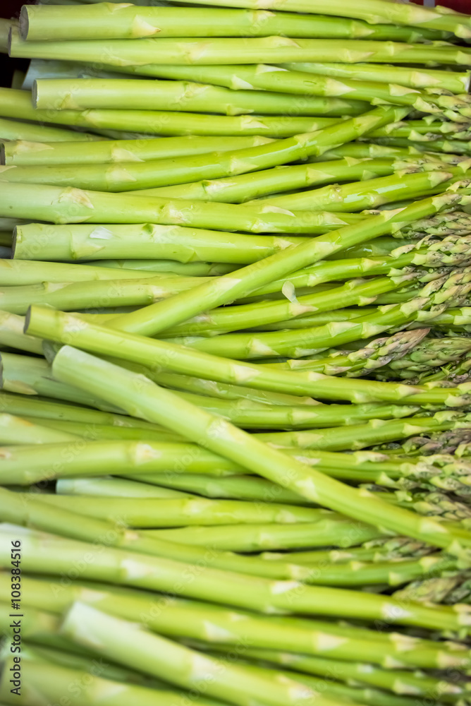 Fresh asparagus selling in a farmers market Fresh asparagus selling in a farmers market
