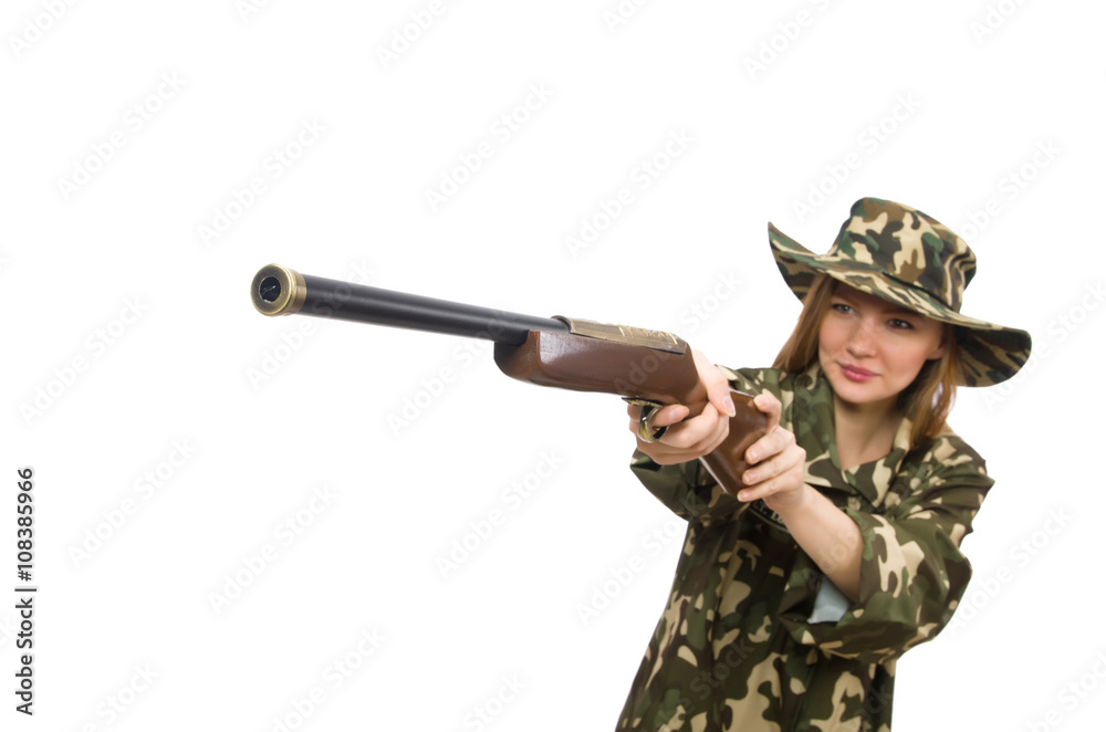 Fototapeta premium Girl in military uniform holding the gun isolated on white