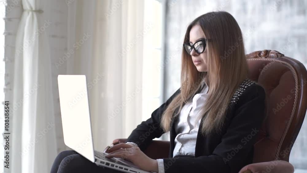 young woman holding a laptop with copy space young woman holding a laptop with copy space
