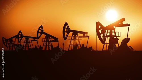 Oil Pumps in a Row at Sunset. Looped 3d animation. Technology and Industrial Concept. HD 1080.