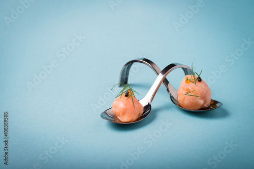 Fototapeta Naklejka Na Ścianę i Meble -  Haute cuisine appetizer of salmon with caviar.