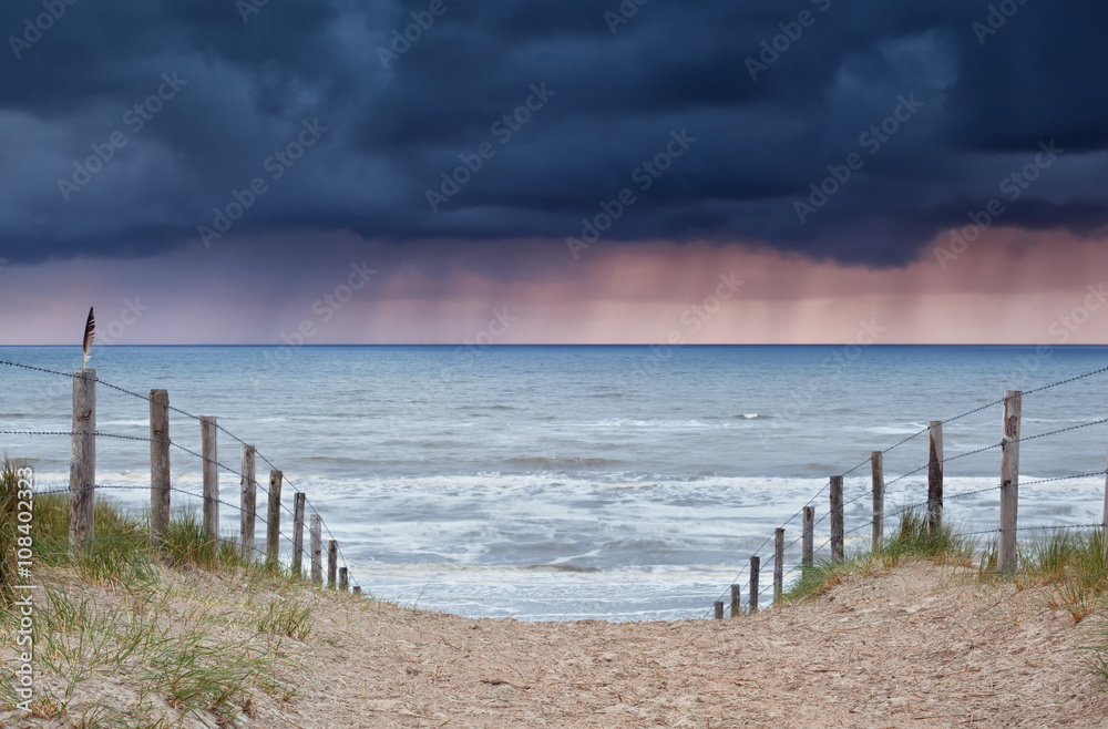 rain and storm coming from North sea to beach