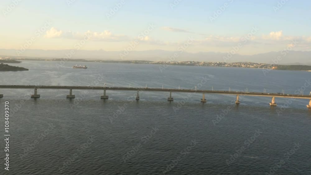 Flying above Rio - Niteroi road bridge with cars, Rio De Janeiro Flying above Rio - Niteroi road bridge with cars, Rio De Janeiro