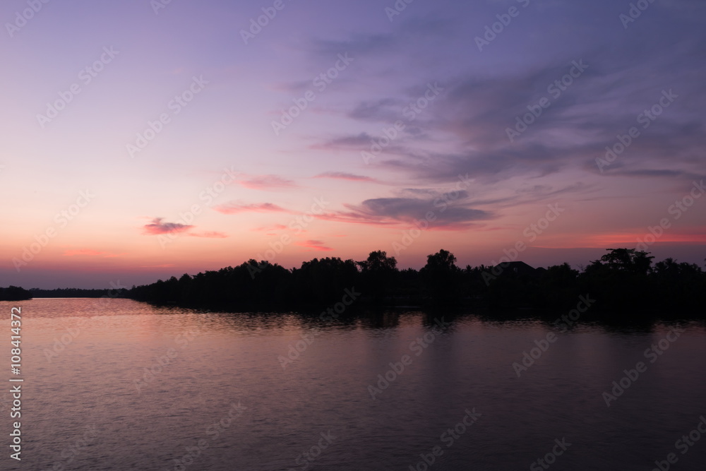 Beautiful sky sunset at Tapee river Suratthani Thailand
