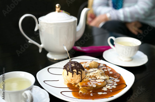 bananas crepe and  ice cream with tea pot