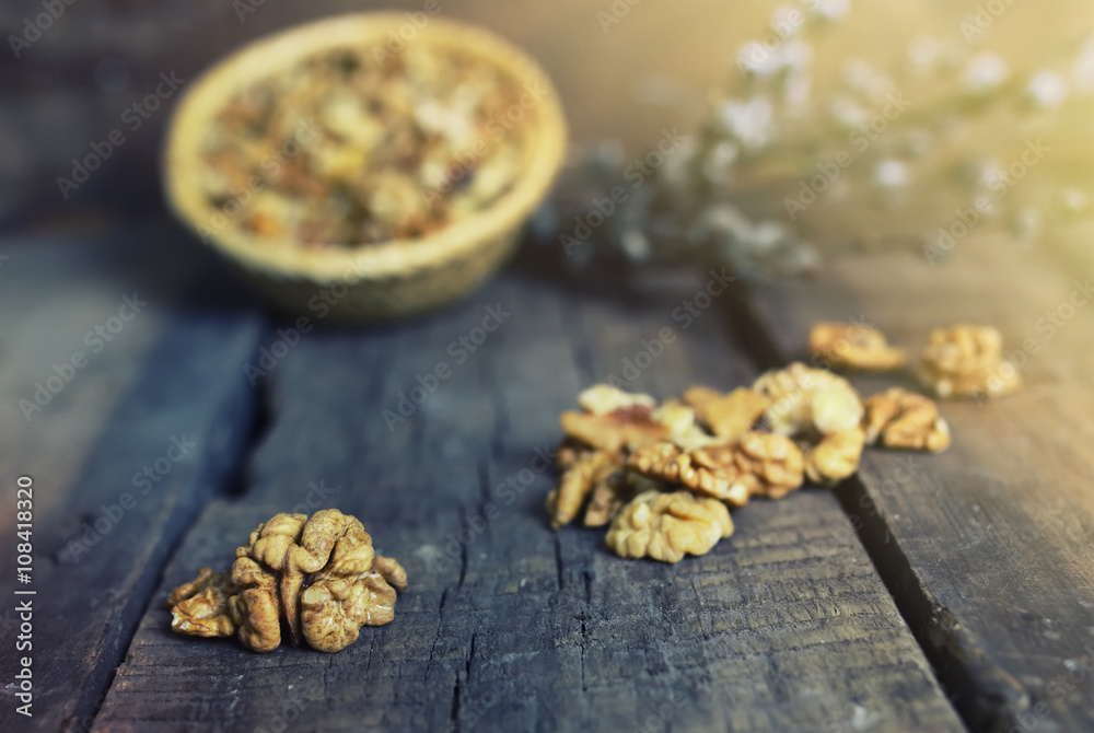 Obraz premium walnut on wooden background
