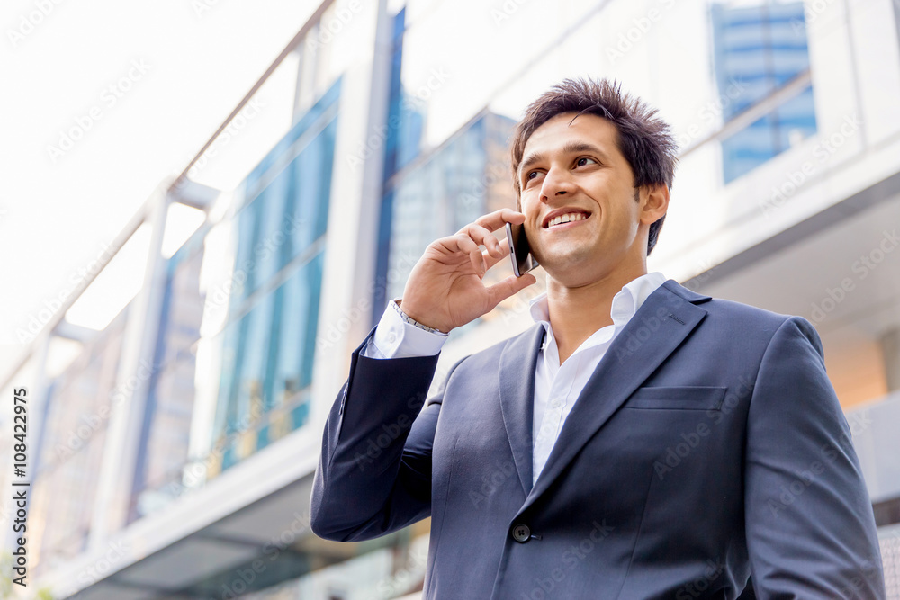 Portrait of confident businessman with mobile phone outdoors Portrait of confident businessman with mobile phone outdoors