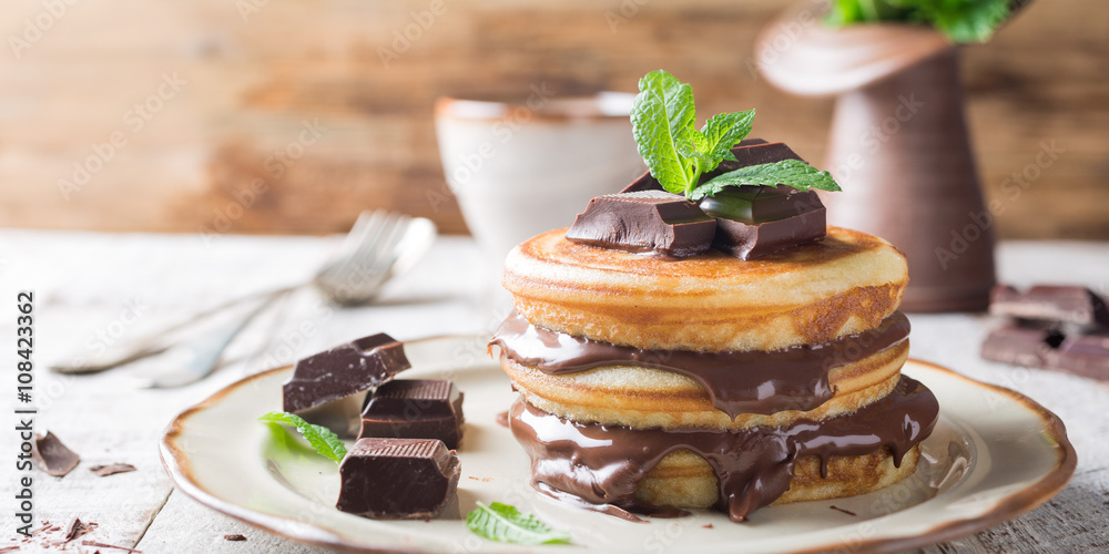Homemade pancakes with chocolate spread. Homemade pancakes with chocolate spread.