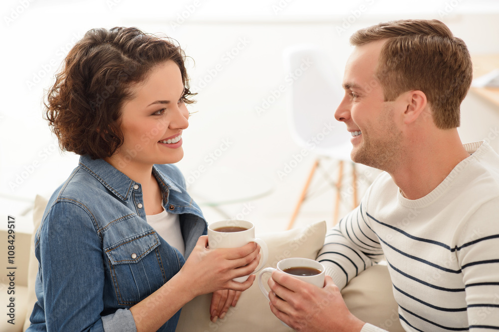 Pleasant couple drinking coffee Pleasant couple drinking coffee