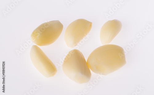 Garlic cloves macro close up on white background