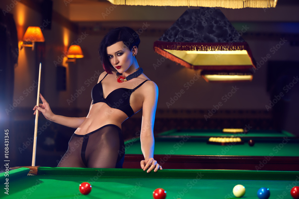 Hot sexy young woman at billiards club playing snooker Stock Photo | Adobe  Stock