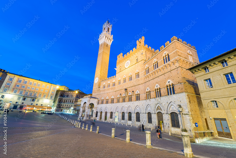 SIENA, ITALY - APRIL 3, 2016: Piazza del Campo with tourists on