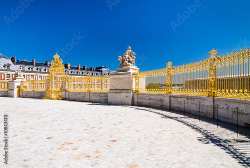 VERSAILLES, FRANCE - April 24, 2009: The main Golden Gate of Palace of Versailles in Paris, France.