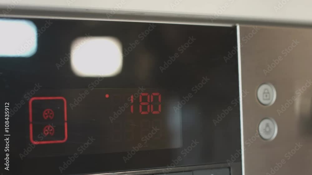 Turning on a kitchen oven Turning on a kitchen oven