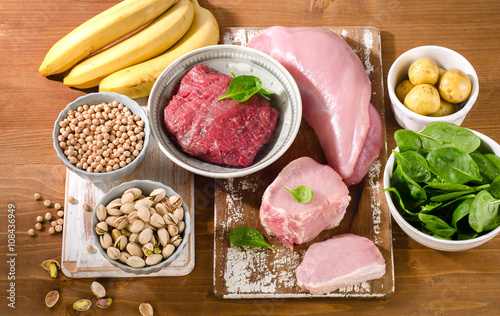 Foods Highest in Vitamin B6 on a wooden background.