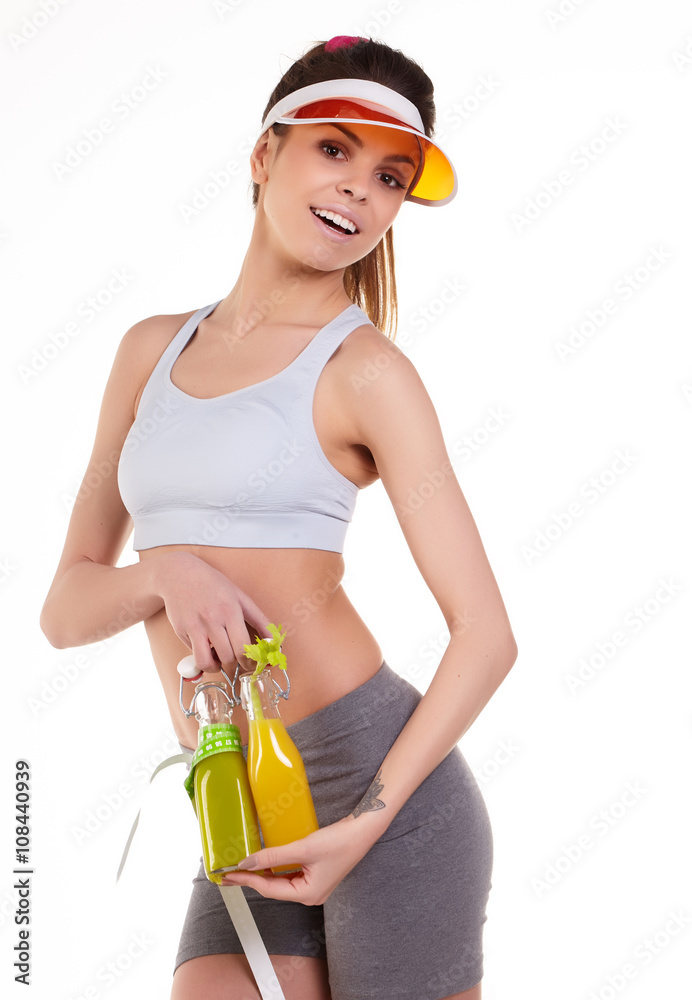 Fit Young Woman with perfect healthy thin body, holding detox ju Fit Young Woman with perfect healthy thin body, holding detox ju