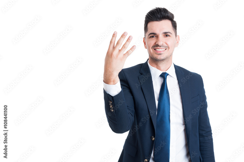 Smiling businessman or sales man showing number four Smiling businessman or sales man showing number four