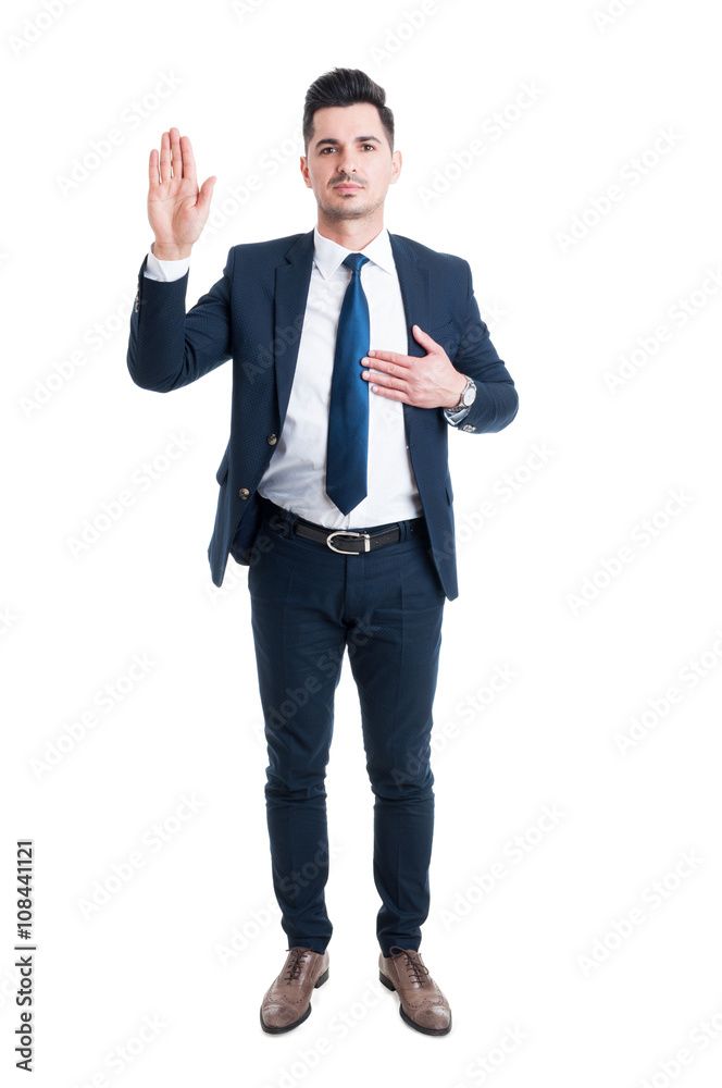 Honest lawyer hand on heart as swear or oath gesture Honest lawyer hand on heart as swear or oath gesture