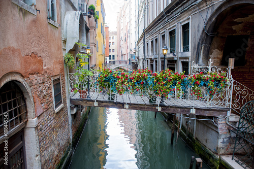  Venice. The bridge between the neighboring houses, decorated wi